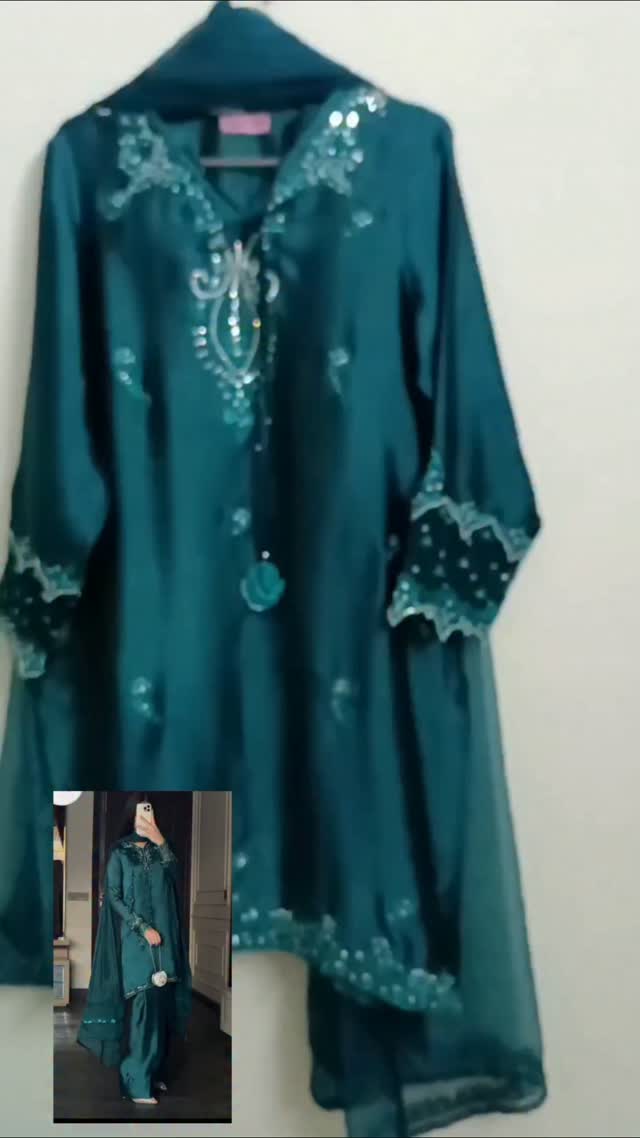 Teal organza suit with sequin work